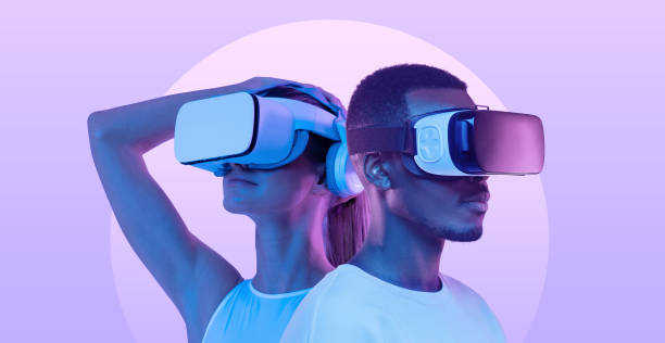 Metaverse people, banner of couple, man and woman in virtual reality headsets exploring VR world Metaverse people, banner of couple, man and woman wearing virtual reality headsets, exploring immersive VR world, playing ar online game together virtual realty stock pictures, royalty-free photos & images