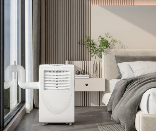 Close-up View Of Portable Air Conditioner In Bedroom Close-up View Of Portable Air Conditioner In Bedroom Portable Air Conditioning stock pictures, royalty-free photos & images